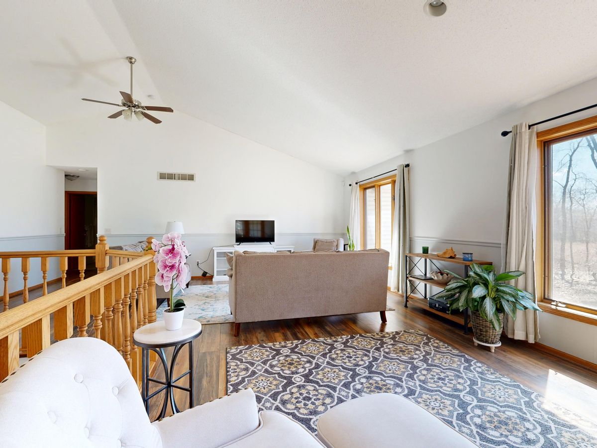Large windows in a bright living room; illustrative stock photograph